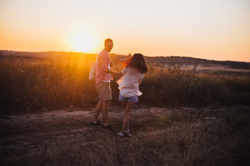 Lovely couple are happy. Genuine emotions by the young family