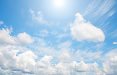 white cumulus clouds in the blue sky