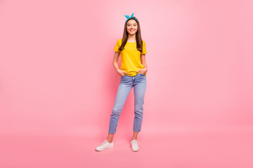 Poster - Full size photo of lovely people with beaming smile putting hands in pockets wearing yellow t-shirt isolated over pink background