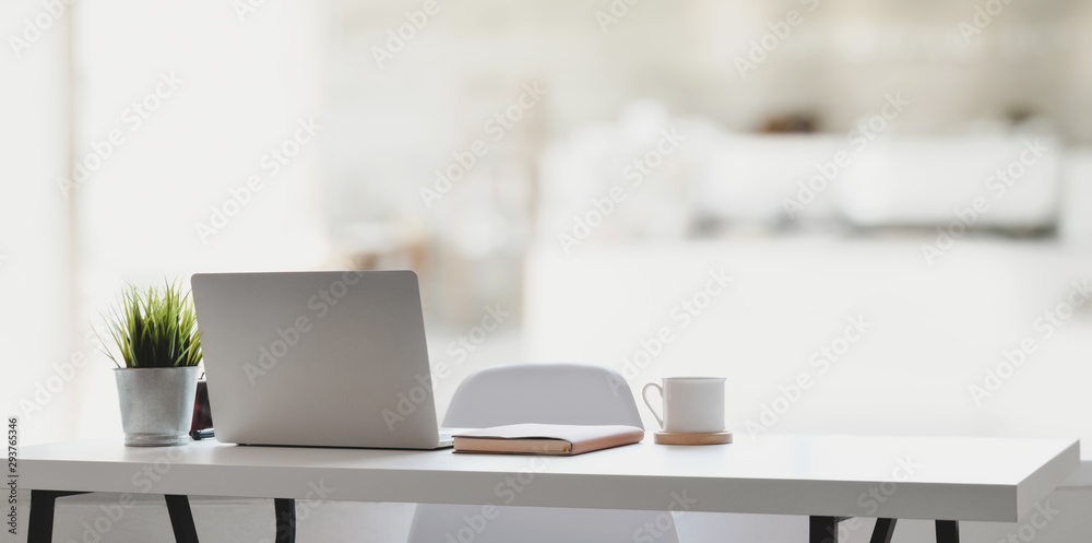 Comfortable workplace with laptop computer, coffee cup and office supplies - obrazy, fototapety, plakaty 