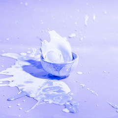 Abstract background with violet paint splash and cup