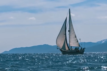  Blur photo - abstract image for the background. Yacht under sail in the ocean.