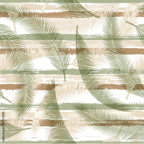 Stylish coconut palm leaves tree branches over