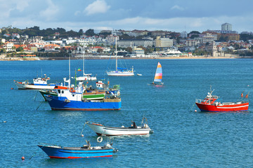 Poster - Fishing boats and luxury yachts docked at Cascais marina, coastal resort and fishing town in Lisbon district, Portugal