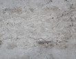 Texture of marble is gray-beige with a large pattern-cracks, spots.