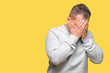 © Krakenimages.com - Middle age arab man wearing sport sweatshirt over isolated background with sad expression covering face with hands while crying. Depression concept.