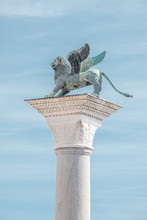 Top Tower Sculpture Of Winged  Lion Of Venice At Doge Palace As Venetian Symbol, Venice, Italy