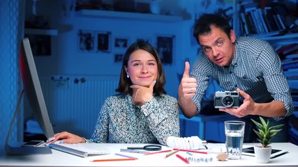 Poster - The guy and the girl are discussing the camera, showing like