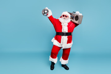 Poster - Full length body size view of his he nice cool fat cheerful cheery glad carefree bearded Santa carrying tape player dancing holding in hand discoball isolated on blue turquoise pastel color background