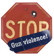 © Rob Goebel - An old stop sign with a bullet hole has a bumper sticker that reads: “Gun violence” to make the message: Stop gun violence..It is an illustration.