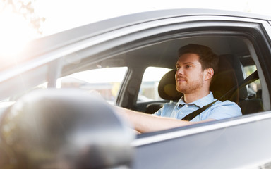 Wall Mural - transport, vehicle and people concept - man or driver driving car in summer