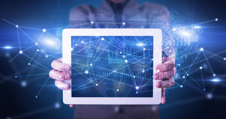 Poster - Elegant hand holding tablet with virtual database and network concept