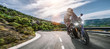 © AA+W - motorbike on the coastal road riding. having fun driving the empty highway on a motorcycle tour journey