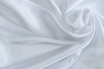 white silk delicate fabric spun and draped