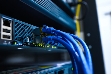 Network device front panel with utp cables connected in data center room