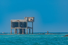 Dilapidated Building On The Sea 