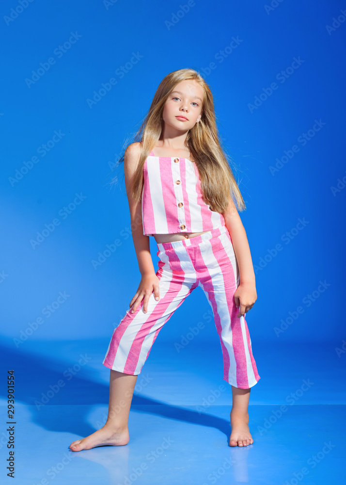 portrait of little model girl in studio Stock Photo | Adobe Stock