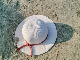 tourist woman white hat on the sand beach