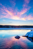 Fototapeta Pomosty - sunrise over frozen lake