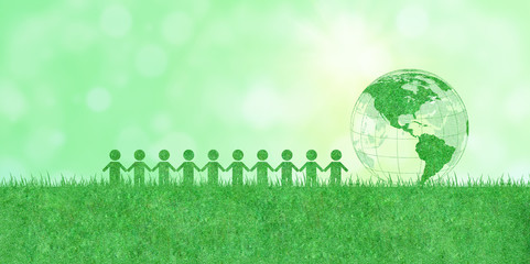 Wall Mural - Ecology and Environmental Concept : People or Human icons and green earth or globe on artificial grass with sunlight in background.