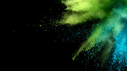 Wall Mural - Explosion of colored powder on black background