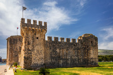 Medieval Kamerlengo Fortress Of The 15th Century With The Flag Of Croatia In Trogir, Croatia. Tower Of Medieval Kamerlengo Fortress In Trogir, Dalmatia, Croatia.