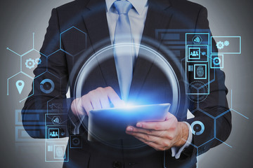 Poster - Businessman using tablet with HUD interface