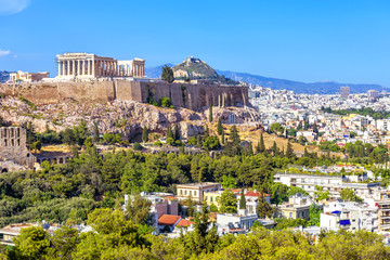 Wall Mural - Acropolis hill rises above Athens city, scenic Greek ruins, Greece