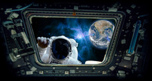 Astronaut Knocking And The Earth "Elements Of This Image Furnished By NASA"
