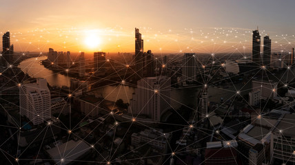 Fototapete - Wireless network and Connection technology concept with Abstract buildings and city background