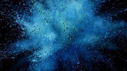 Super slow motion of coloured powder explosion isolated on black background. Filmed on high speed cinema camera, 1000fps.