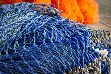 Colourful Fishing Nets On A Jetty