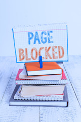 Fototapete - Text sign showing Page Blocked. Business photo text Users are prevented from being accessed or used the webpage pile stacked books notebook pin clothespin colored reminder white wooden