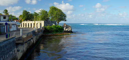 Espace Wizosky - open space for relaxation and outdoor events created out of the ruins of a former seaside factory in Le Moule city, Guadeloupe