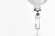 0.9% Normal saline solution (NSS) isolated on white background and for medical background. Close up image. Drops of saline. 