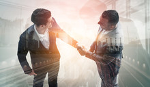 Double Exposure Image Of Business People Handshake On City Office Building In Background Showing Partnership Success Of Business Deal. Concept Of Corporate Teamwork, Trust Partner And Work Agreement.