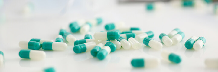 Wall Mural - Tablets scattered on the table of the pharmaceutical laboratory pill for the prescription and treatment of various diseases chemistry