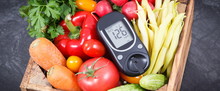 Glucometer With Fresh Vegetables As Source Minerals And Vitamins. Diabetes, Healthy Lifestyles And Dieting