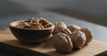 Walnut Kernels In Olive Wood Bowl