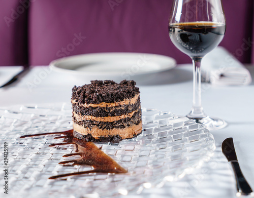 Cuadros en Lienzo chocolate cake with sherry in restaurant