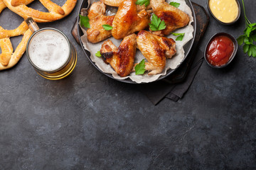 Canvas Print - Hot chicken wings and draft beer