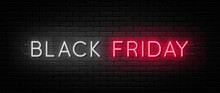 Black Friday Sale. Black Friday Neon Sign On Brick Wall Background. Glowing White And Red Neon Text For Advertising And Promotion. Banner And Background, Brochure And Flyer Design Concept
