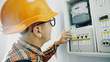 © procinemastock - Electrician opening an electrical fuse box