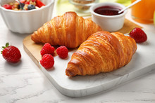 Tasty Breakfast With Croissants Served On White Wooden Table, Closeup