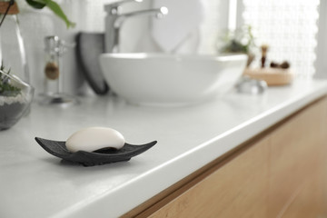 soap bar on light countertop in bathroom