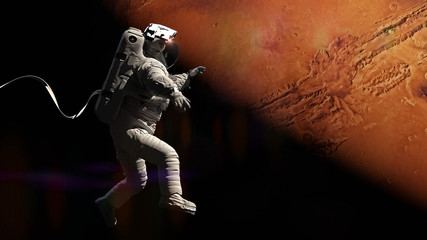 Wall Mural - astronaut during a space walk in orbit of planet Mars