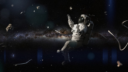 Wall Mural - astronaut in distress, space debris in orbit of planet earth