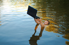 Young Man Drowns, But Saves The Laptop From The Water