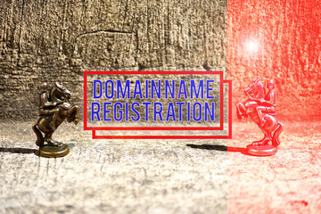 Text sign showing Domain Name Registration. Business photo showcasing Own an IP Address Identify a particular Webpage Two Bronze Chess Pieces Knights Facing Each Other in Focus and Defocused