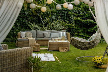 Wall Mural - Cozy sofa set in the garden